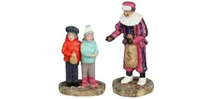 Luville Molendam Piet geeft pepernoten
